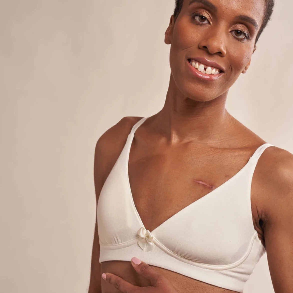 Molly Pocketed Plunge Bra in Cream |  AnaOno | Post-surgery bras made just for those affected by breast cancer and breast surgery.